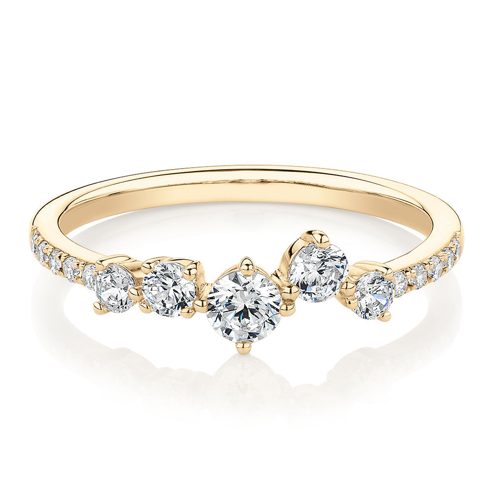 Dress ring with 0.46 carats* of diamond simulants in 10 carat yellow gold