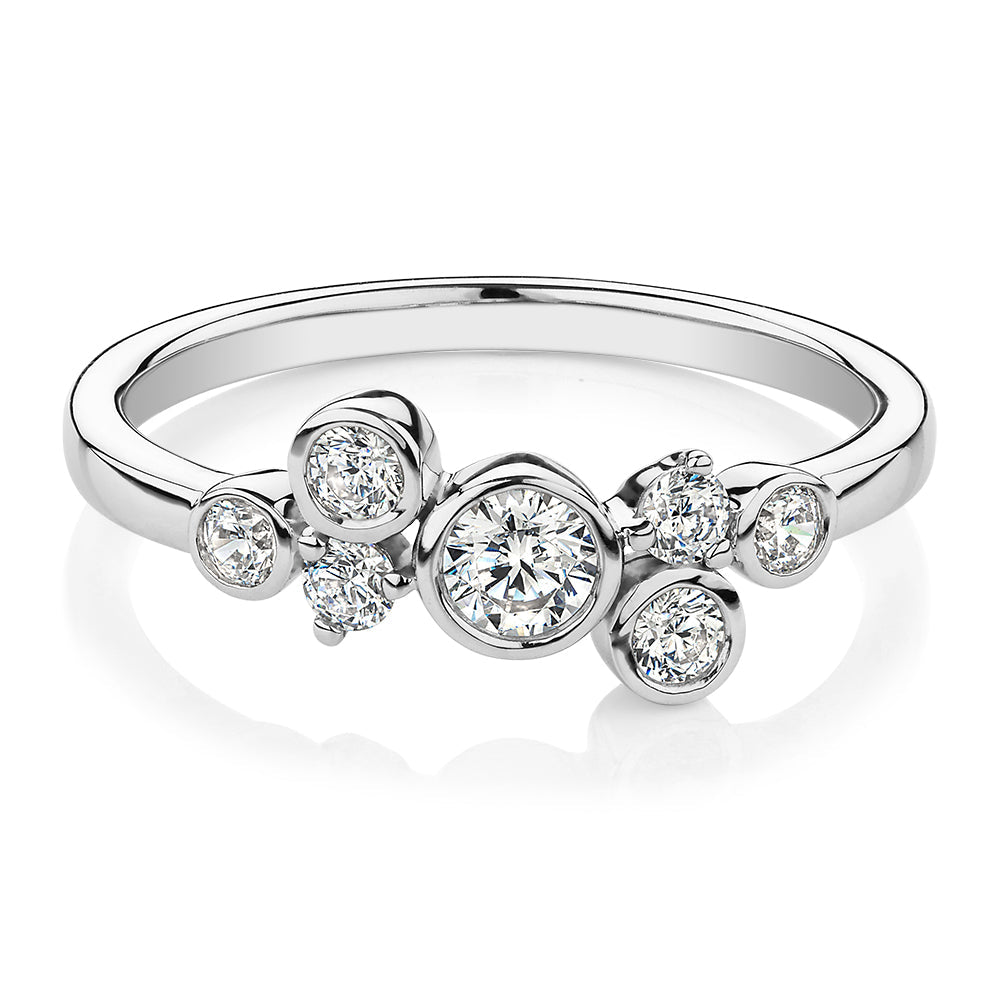 Dress ring with 0.39 carats* of diamond simulants in 10 carat white gold