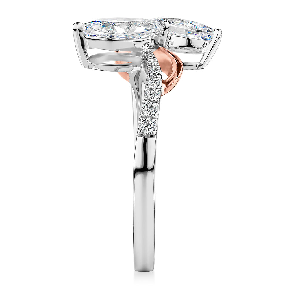 Dress ring with 1.06 carats* of diamond simulants in 10 carat rose and white gold
