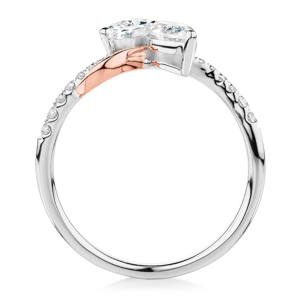 Dress ring with 1.06 carats* of diamond simulants in 10 carat rose and white gold