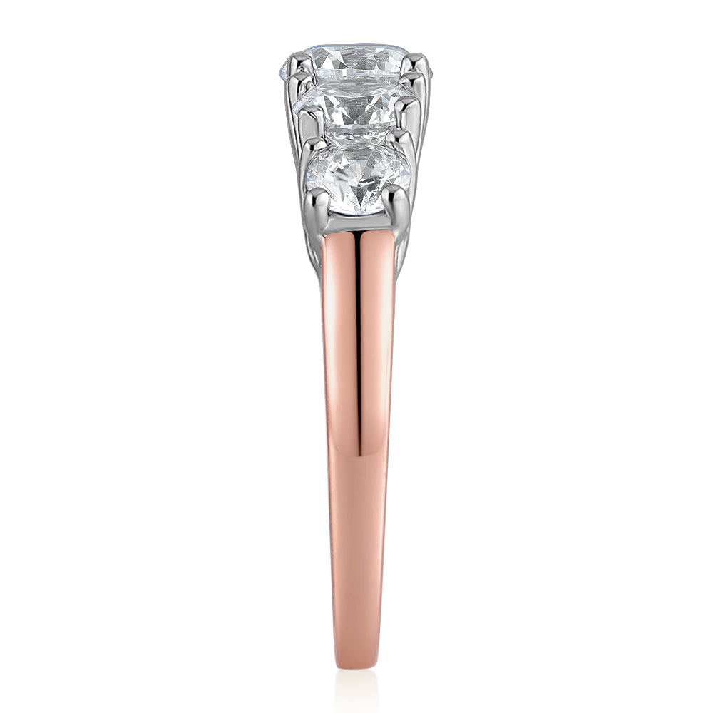 Dress ring with 2.26 carats* of diamond simulants in 10 carat rose and white gold
