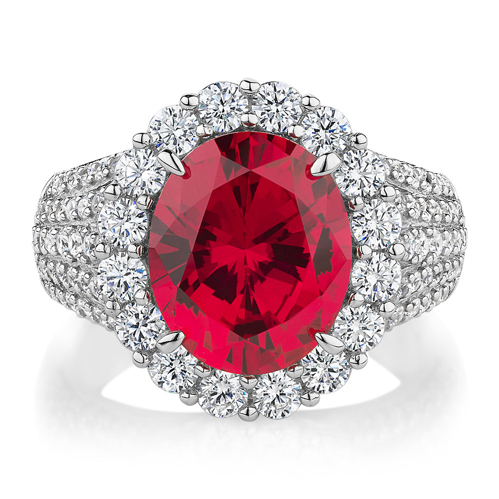 Dress ring with ruby simulant and 1.83 carats* of diamond simulants in sterling silver