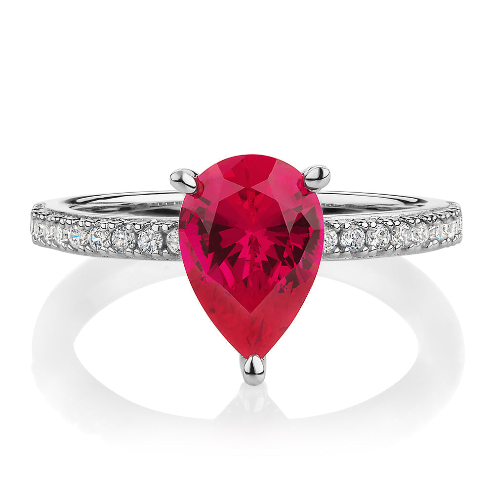 Dress ring with ruby simulant and 0.24 carats* of diamond simulants in ...