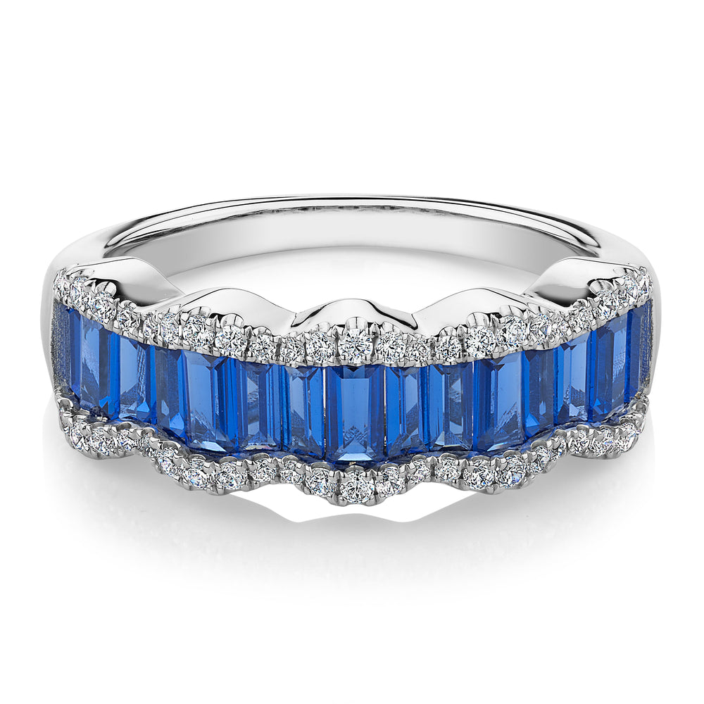 Dress ring with sapphire simulants and 0.24 carats* of diamond simulants in 10 carat white gold