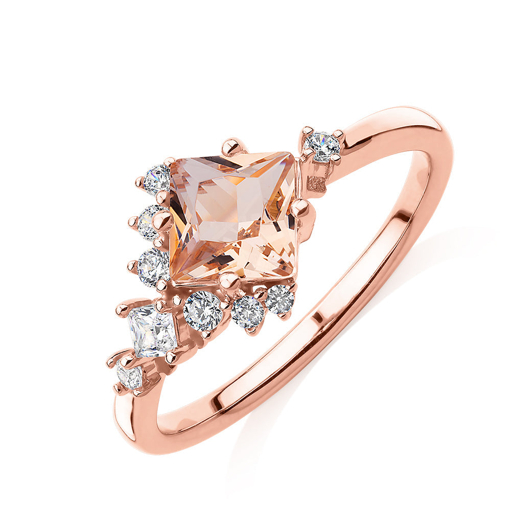 Princess Cut and Round Brilliant shouldered engagement ring with morganite simulant and diamond simulants in 10 carat rose gold
