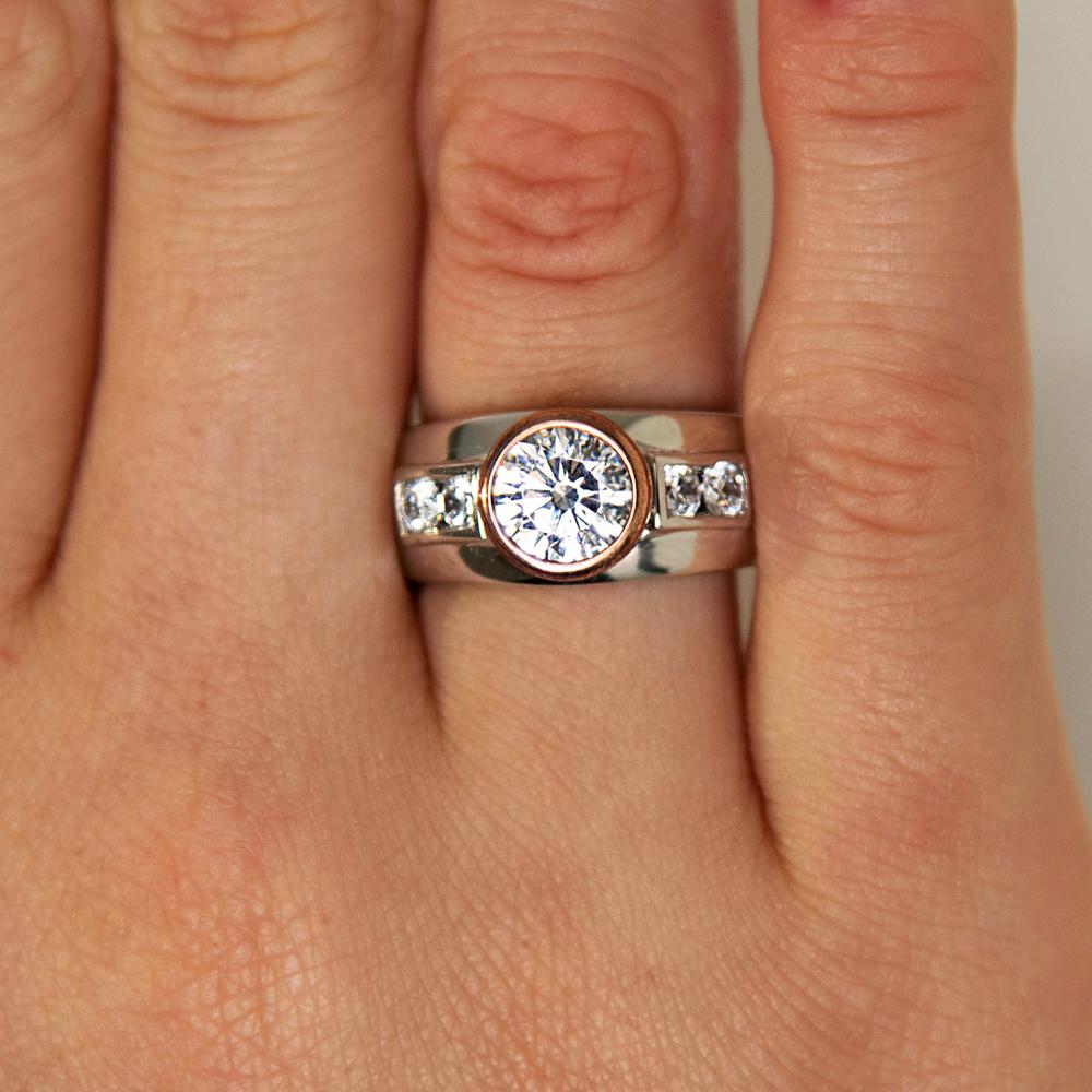 Synergy dress ring with 2.11 carats* of diamond simulants in 10 carat rose gold and sterling silver