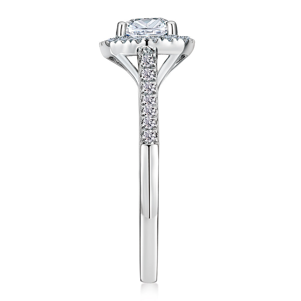Cushion and Round Brilliant halo engagement ring with 1.08 carats* of diamond simulants in 14 carat