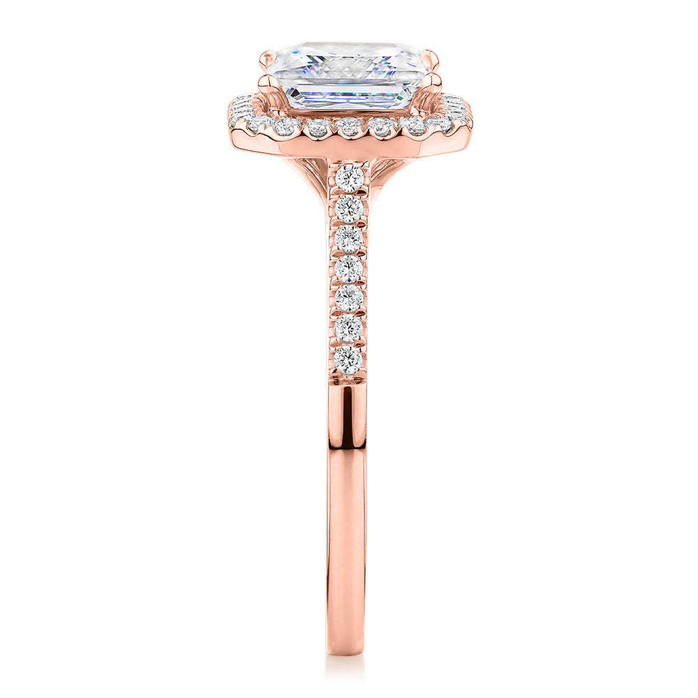 Princess Cut and Round Brilliant halo engagement ring with 2.21 carats* of diamond simulants in 14 carat rose gold
