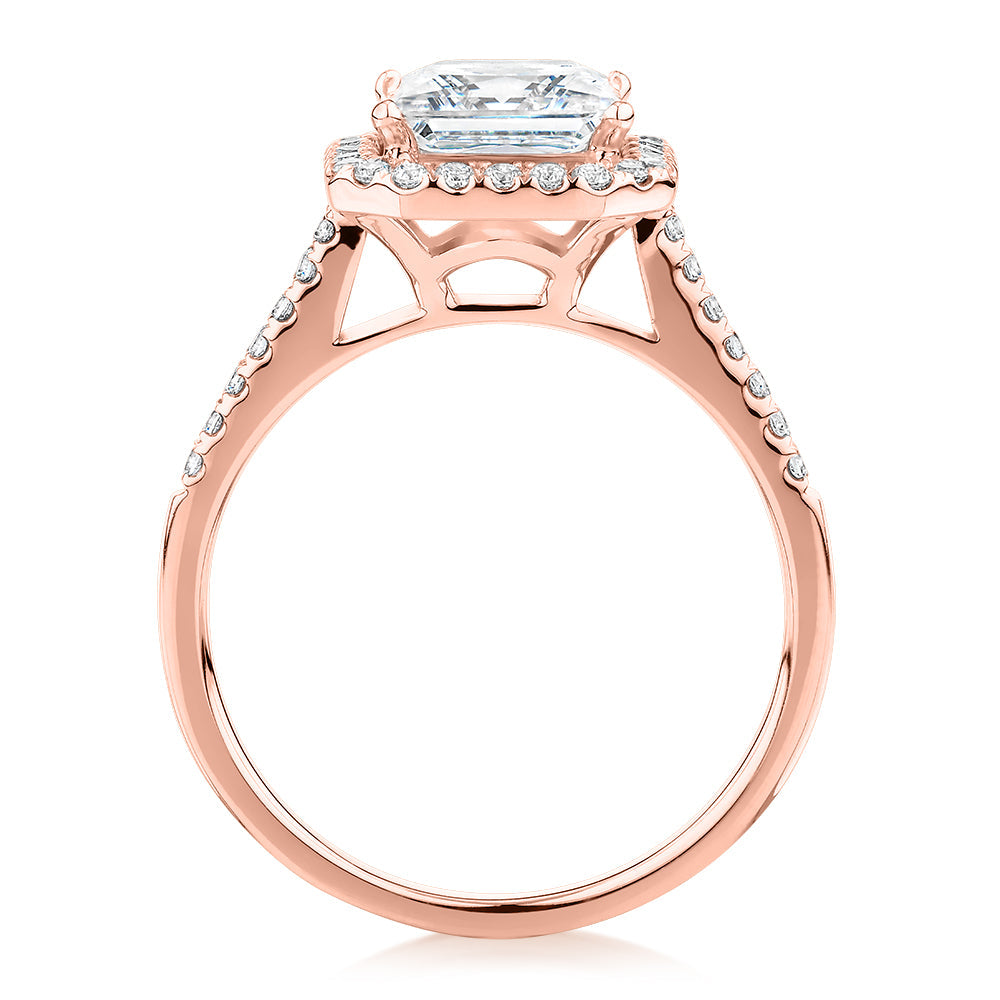 Princess Cut and Round Brilliant halo engagement ring with 2.21 carats* of diamond simulants in 14 carat rose gold