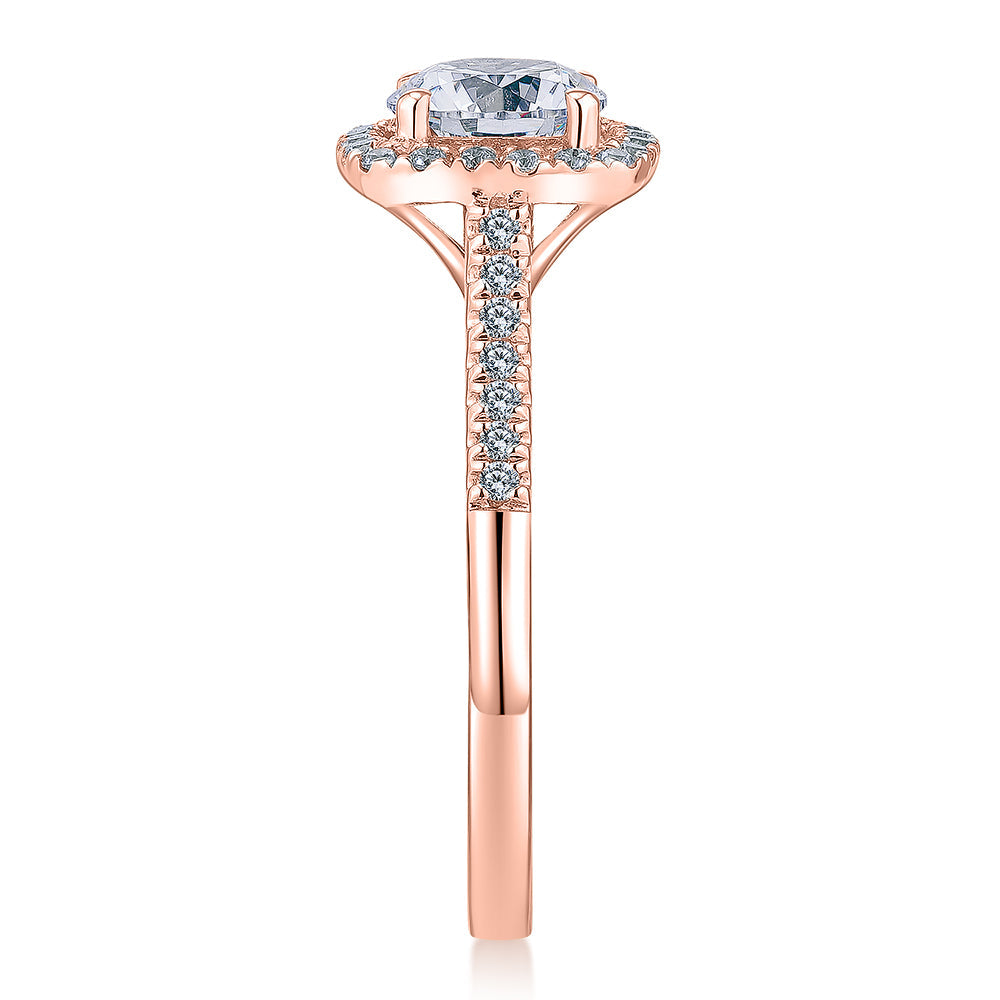Round Brilliant halo engagement ring with 1.26 carats* of diamond simulants in 14 carat rose gold