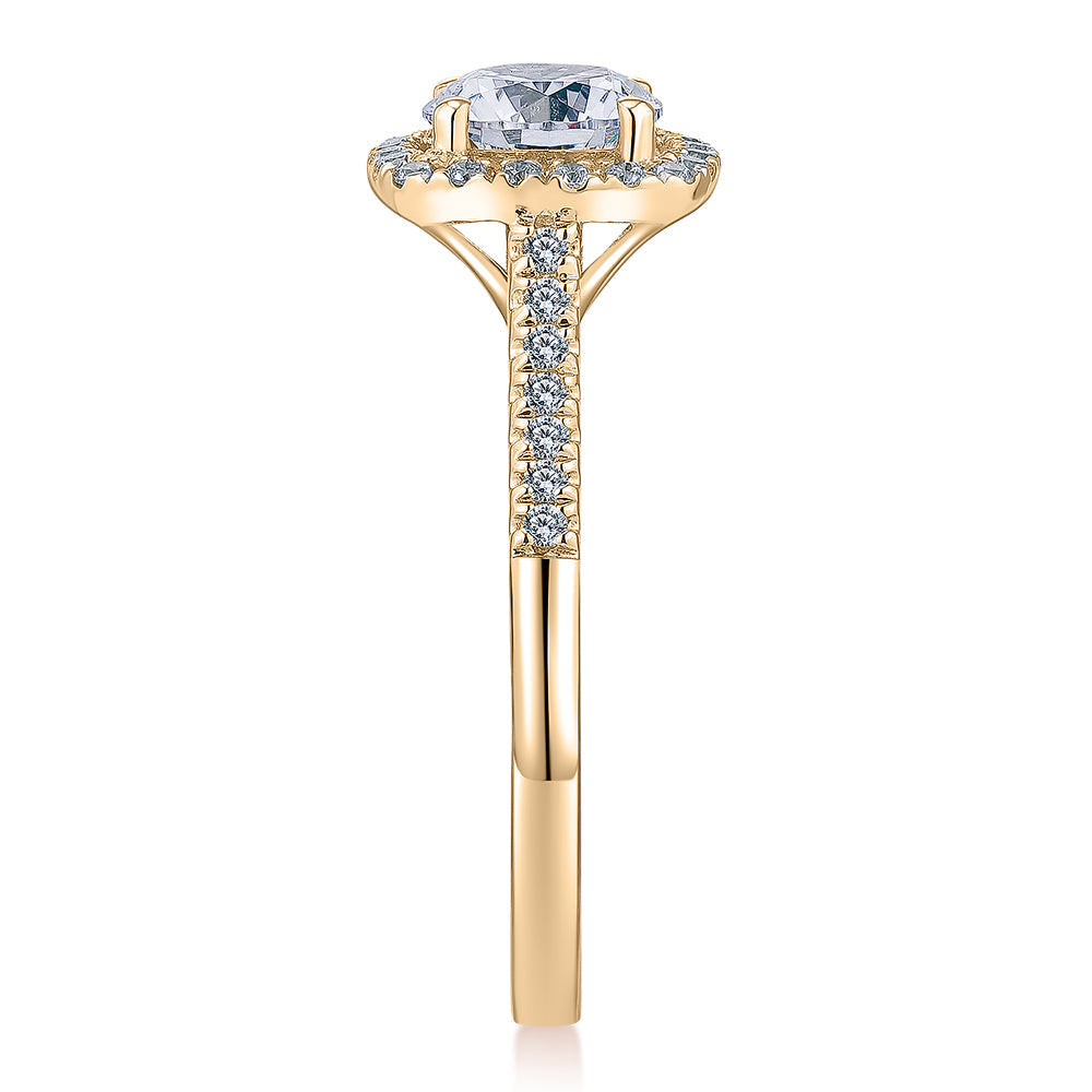 Round Brilliant halo engagement ring with 1.26 carats* of diamond simulants in 14 carat yellow gold