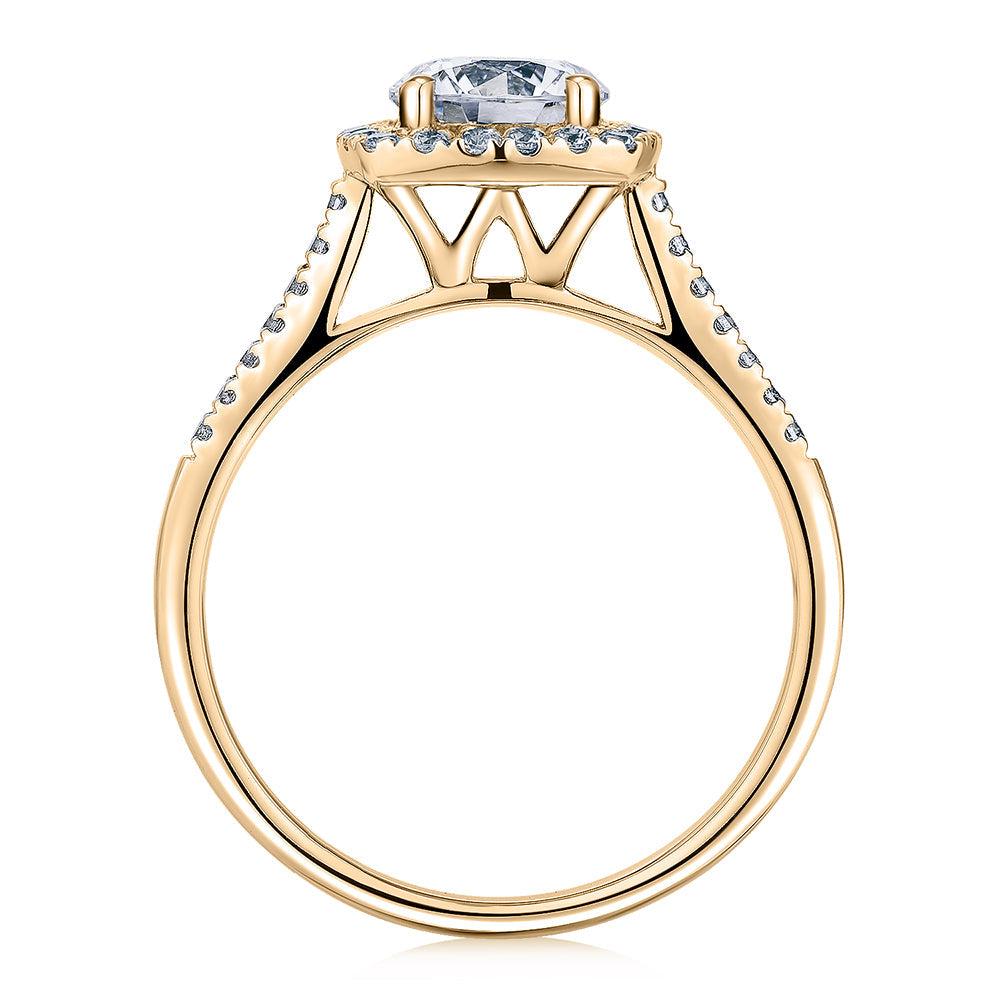 Round Brilliant halo engagement ring with 1.26 carats* of diamond simulants in 14 carat yellow gold