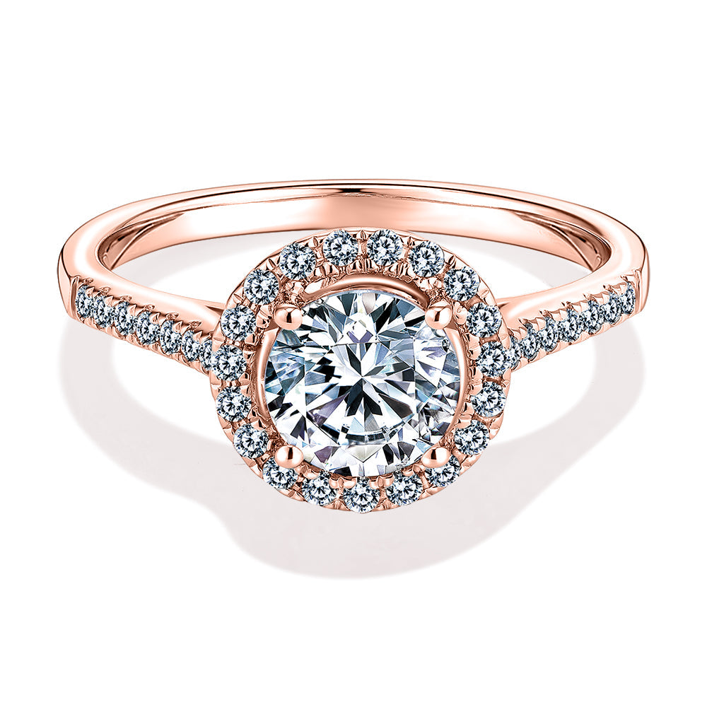 Round Brilliant halo engagement ring with 1.25 carats* of diamond simulants in 14 carat rose gold