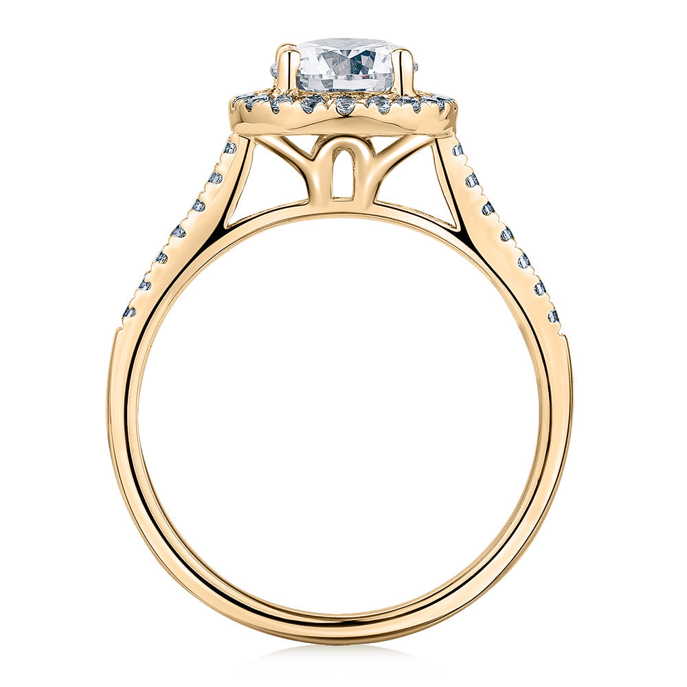 Round Brilliant halo engagement ring with 1.25 carats* of diamond simulants in 14 carat yellow gold