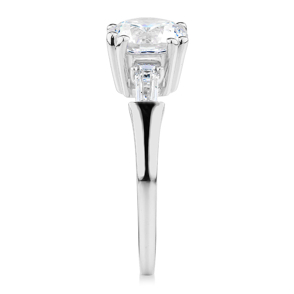 Round Brilliant and Baguette shouldered engagement ring with 2.46 carats* of diamond simulants in 10 carat white gold