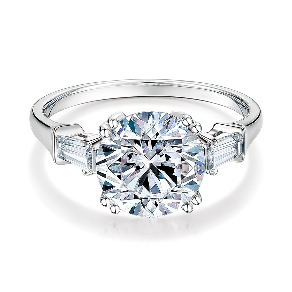 Round Brilliant and Baguette shouldered engagement ring with 3.17 carats* of diamond simulants in 10 carat white gold
