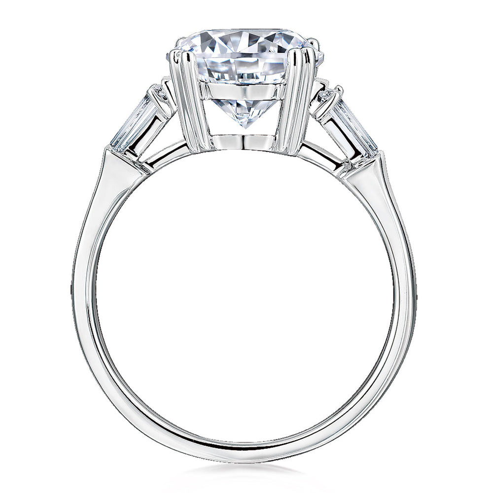 Round Brilliant and Baguette shouldered engagement ring with 3.17 carats* of diamond simulants in 10 carat white gold