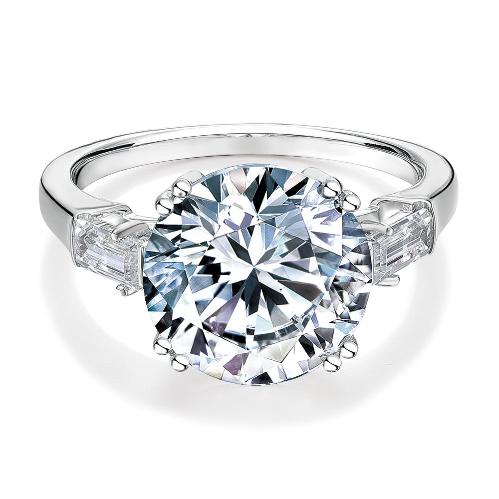Round Brilliant and Baguette shouldered engagement ring with 5.33 carats* of diamond simulants in 10 carat white gold