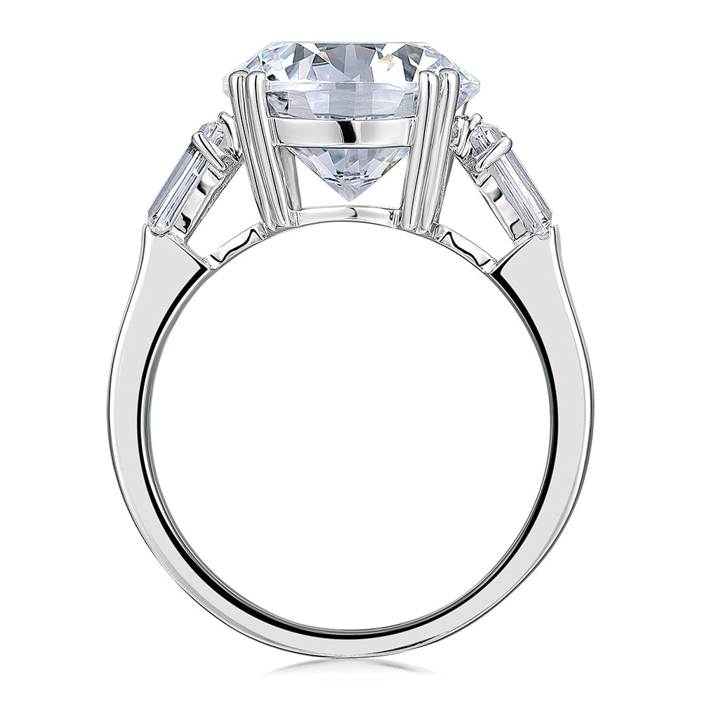 Round Brilliant and Baguette shouldered engagement ring with 5.33 carats* of diamond simulants in 10 carat white gold