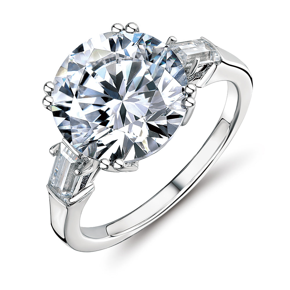 Round Brilliant and Baguette shouldered engagement ring with 5.33 carats* of diamond simulants in 10 carat white gold