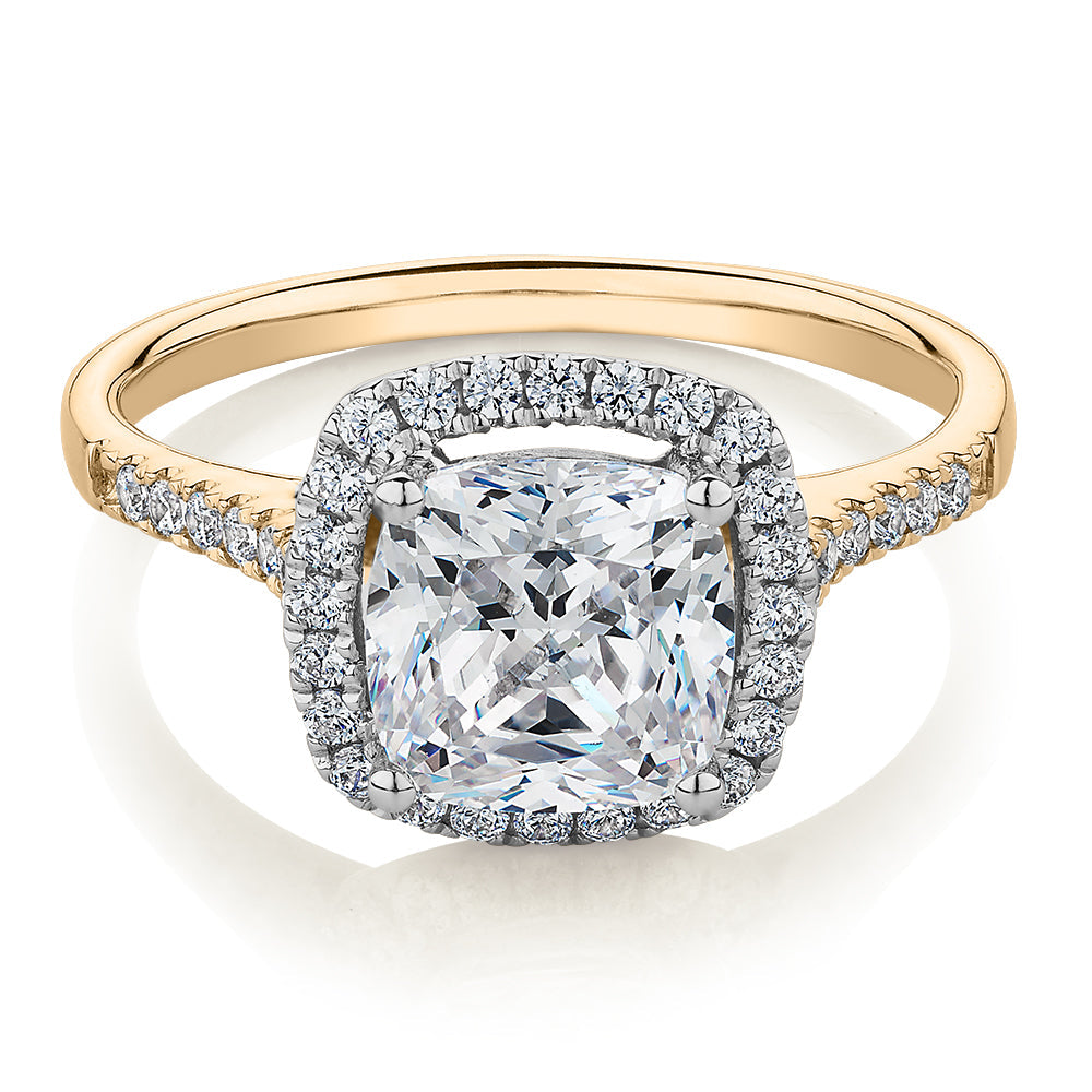Cushion and Round Brilliant halo engagement ring with 1.91 carats* of diamond simulants in 14 carat yellow and white gold