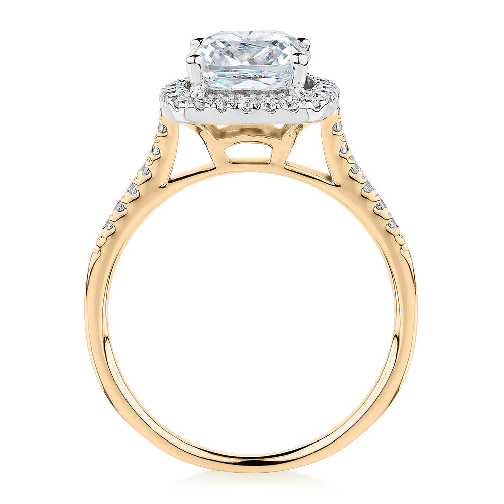Cushion and Round Brilliant halo engagement ring with 1.91 carats* of diamond simulants in 14 carat yellow and white gold
