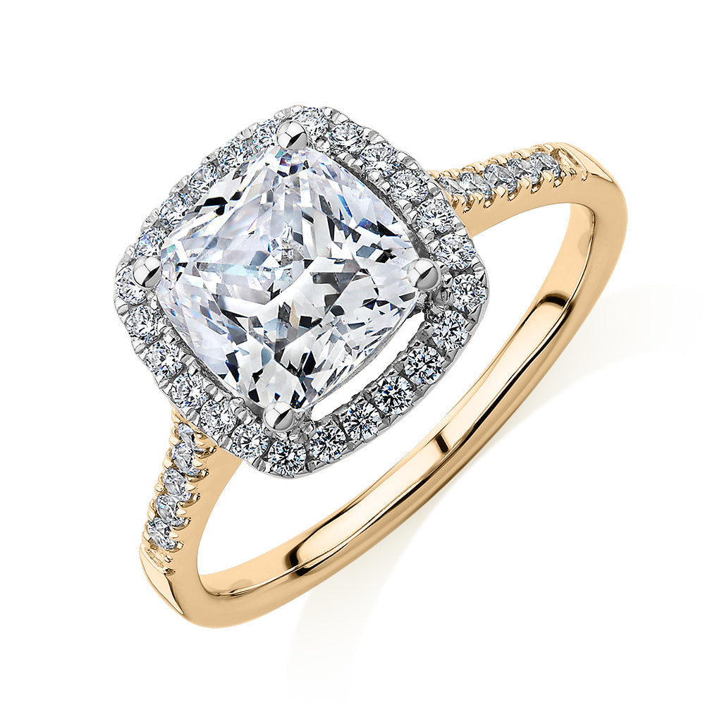 Cushion and Round Brilliant halo engagement ring with 1.91 carats* of diamond simulants in 14 carat yellow and white gold