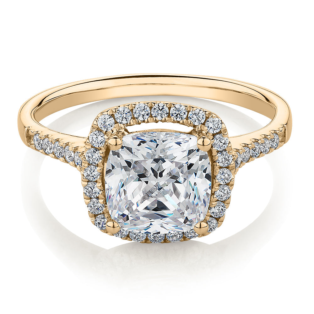 Cushion and Round Brilliant halo engagement ring with 1.91 carats* of diamond simulants in 14 carat yellow gold