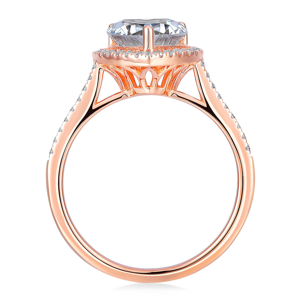Heart and Round Brilliant halo engagement ring with 1.94 carats* of diamond simulants in 14 carat rose gold