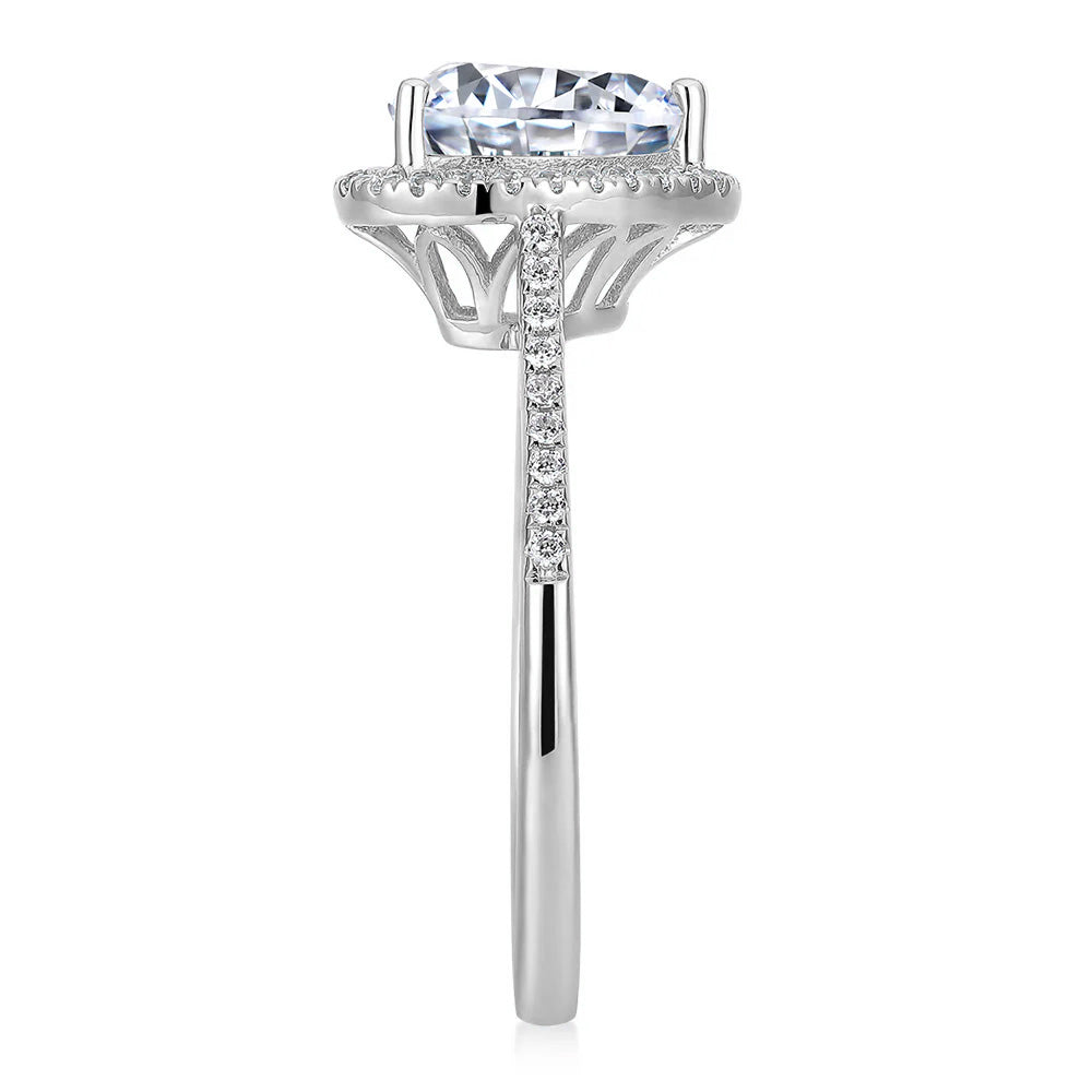Heart and Round Brilliant halo engagement ring with 1.94 carats* of diamond simulants in 14 carat white gold