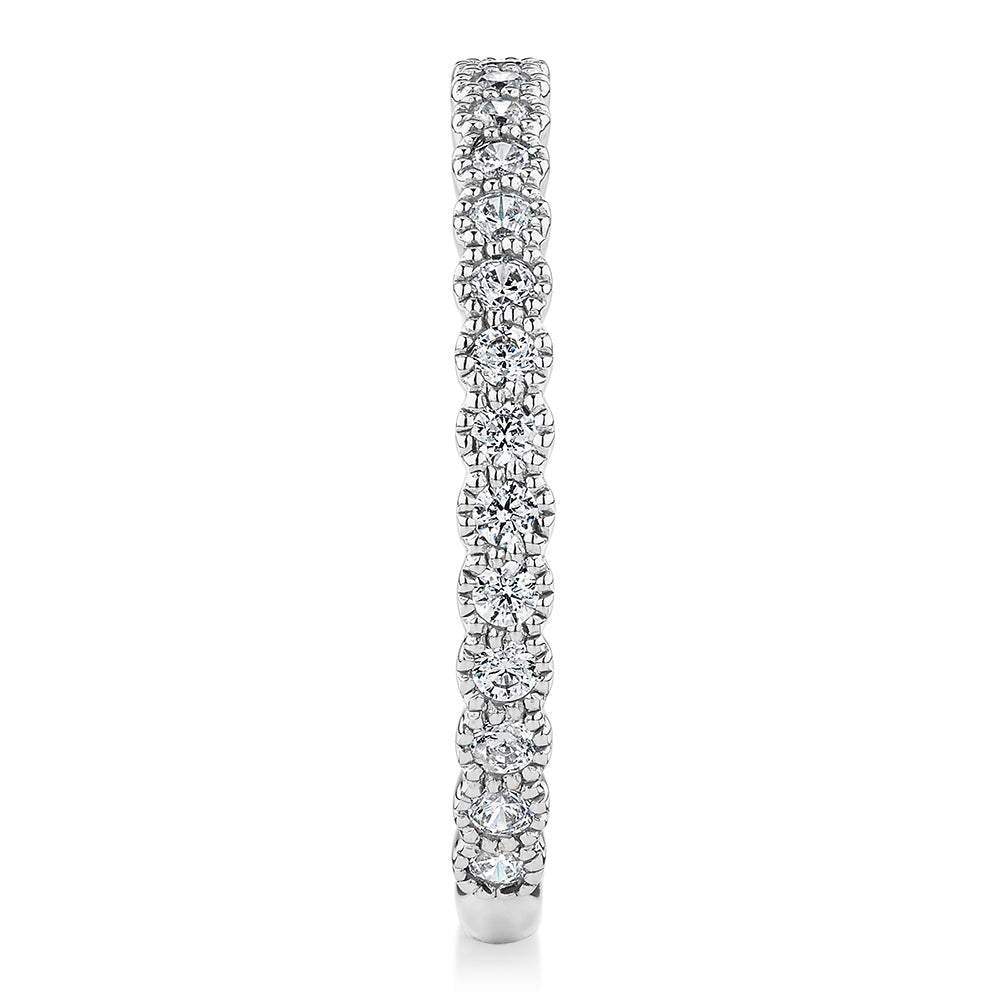 Wedding or eternity band with 0.4 carats* of diamond simulants in 10 carat white gold