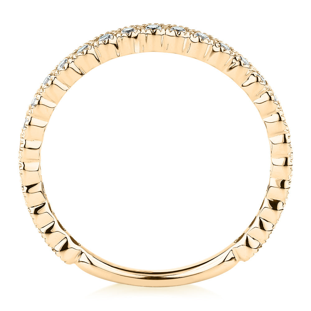 Wedding or eternity band with 0.4 carats* of diamond simulants in 10 carat yellow gold