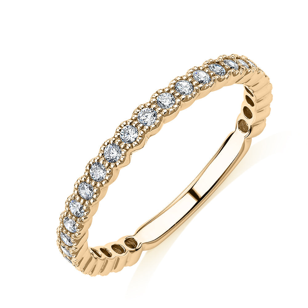 Wedding or eternity band with 0.4 carats* of diamond simulants in 10 carat yellow gold