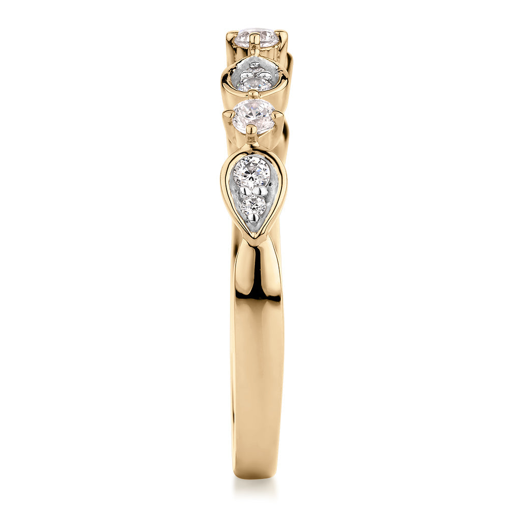 Wedding or eternity band with 0.33 carats* of diamond simulants in 10 carat yellow gold