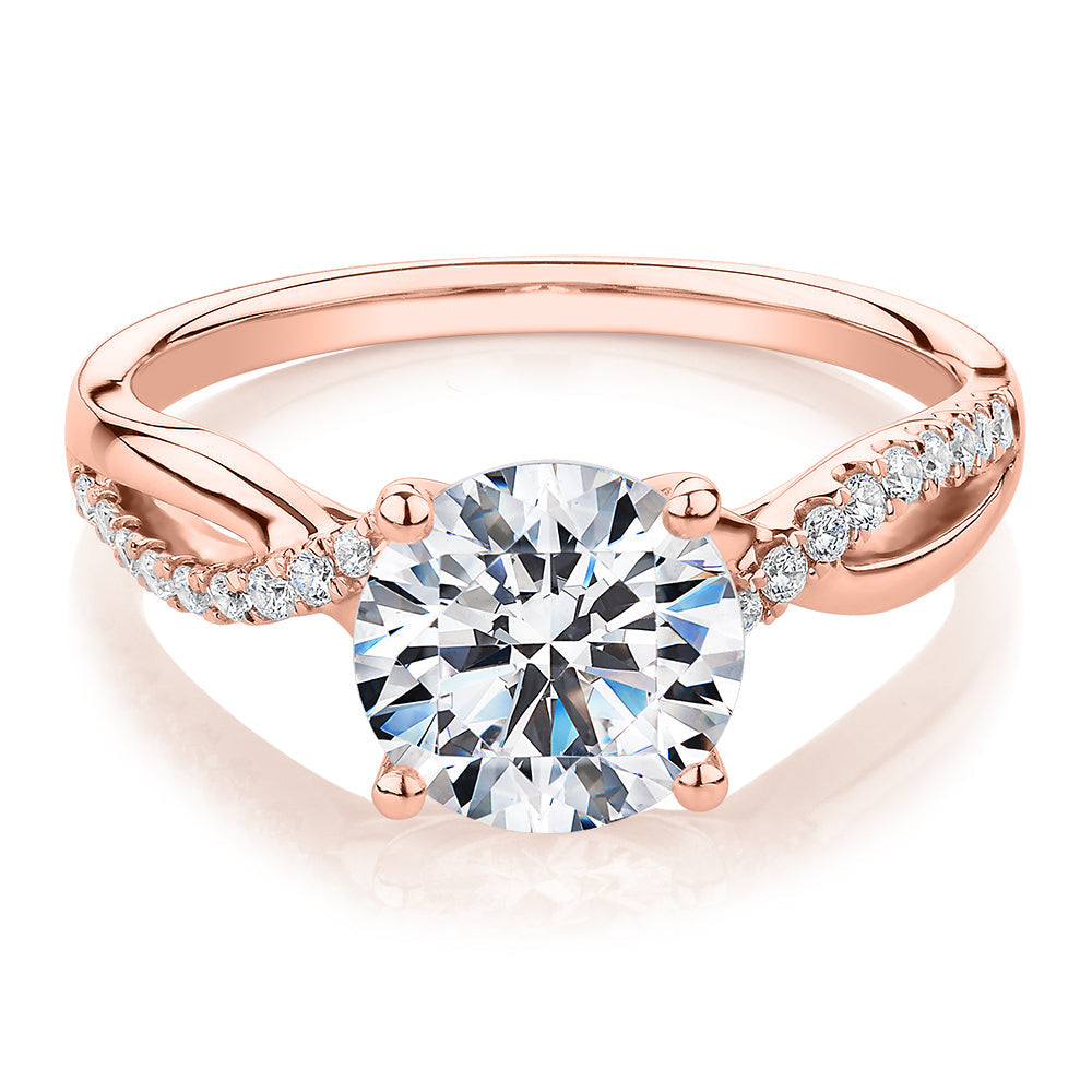 Round Brilliant shouldered engagement ring with 2.17 carats* of diamond simulants in 14 carat rose gold