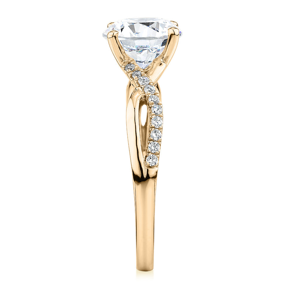 Round Brilliant shouldered engagement ring with 2.17 carats* of diamond simulants in 14 carat yellow gold