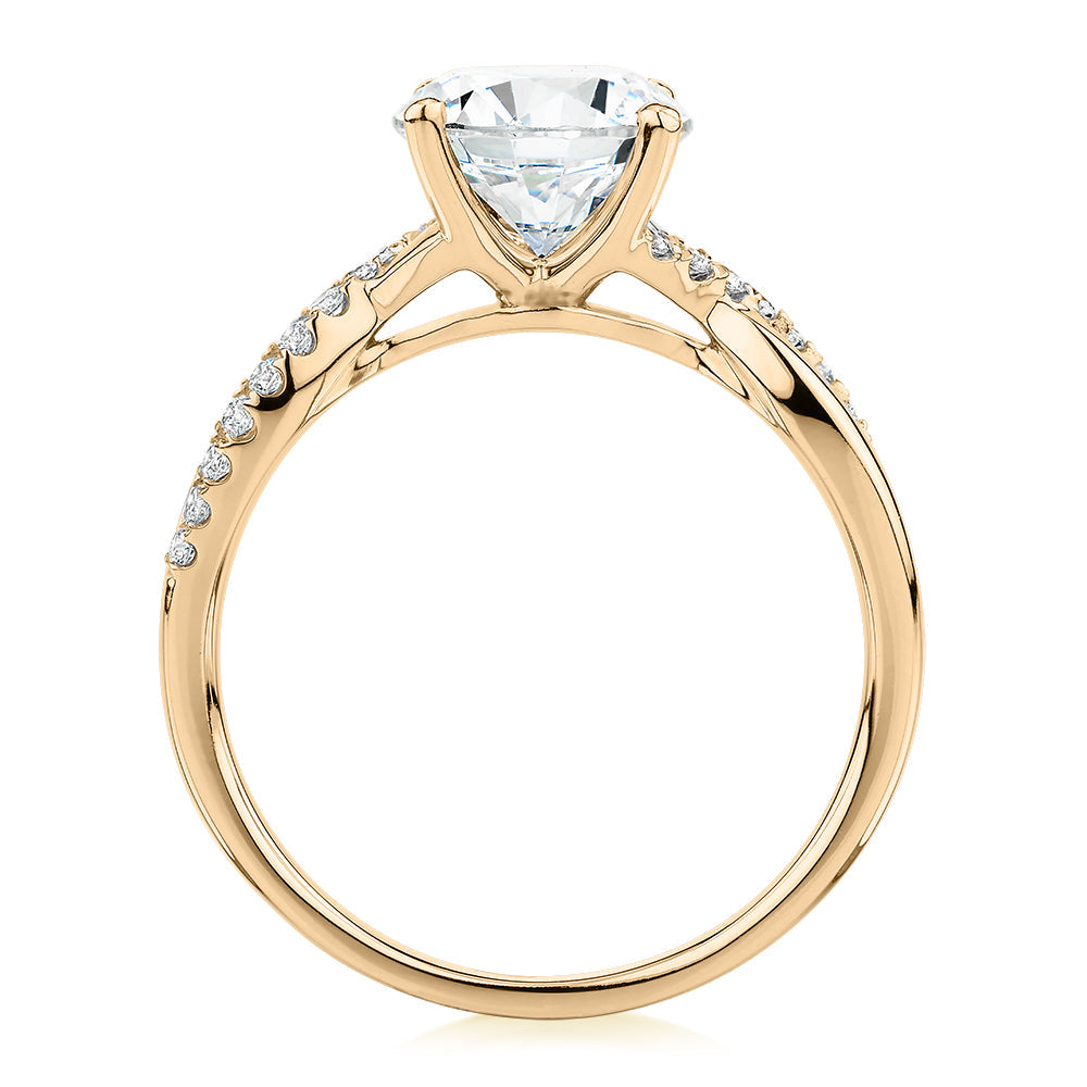 Round Brilliant shouldered engagement ring with 2.17 carats* of diamond simulants in 14 carat yellow gold