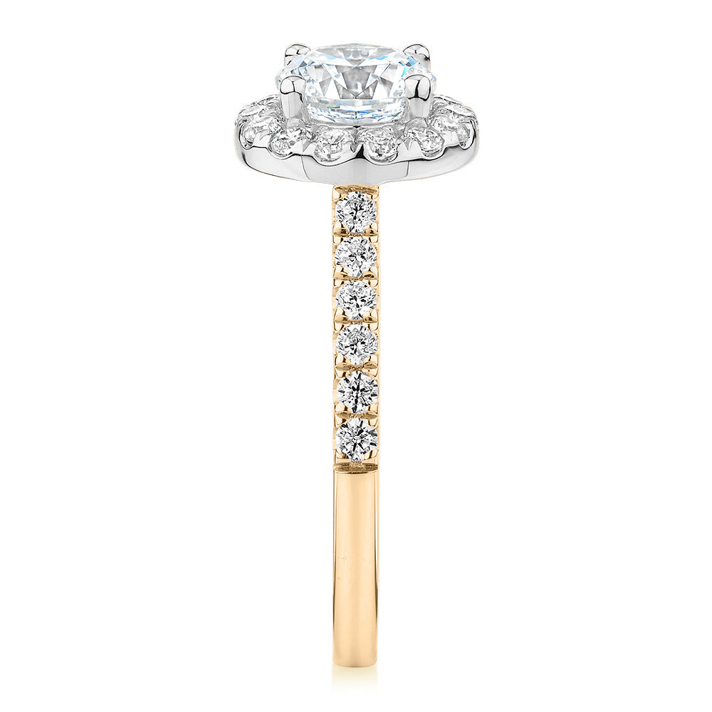 Round Brilliant halo engagement ring with 1.61 carats* of diamond simulants in 14 carat yellow and white gold