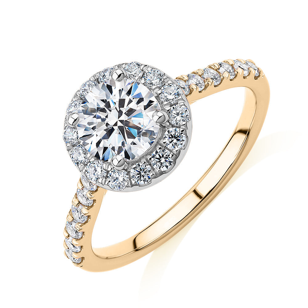Round Brilliant halo engagement ring with 1.61 carats* of diamond simulants in 14 carat yellow and white gold