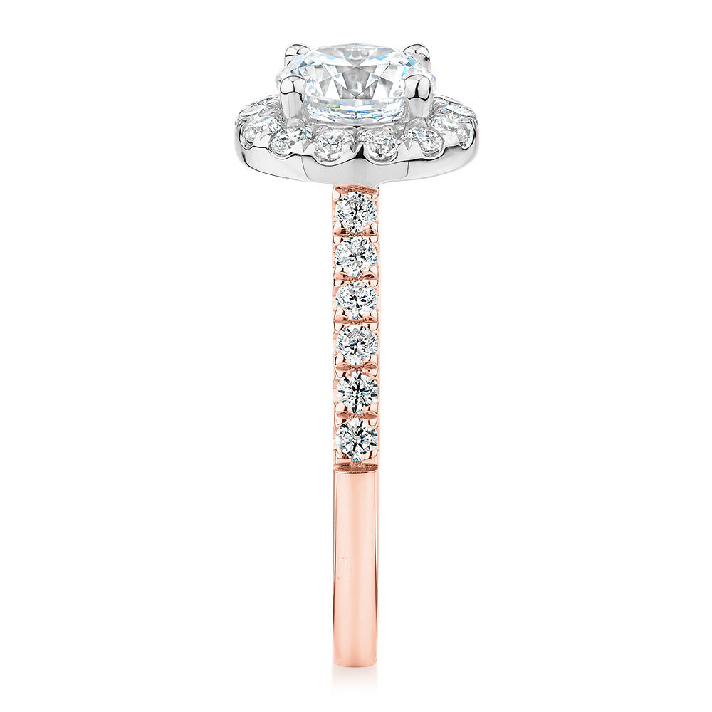 Round Brilliant halo engagement ring with 1.61 carats* of diamond simulants in 14 carat rose and white gold