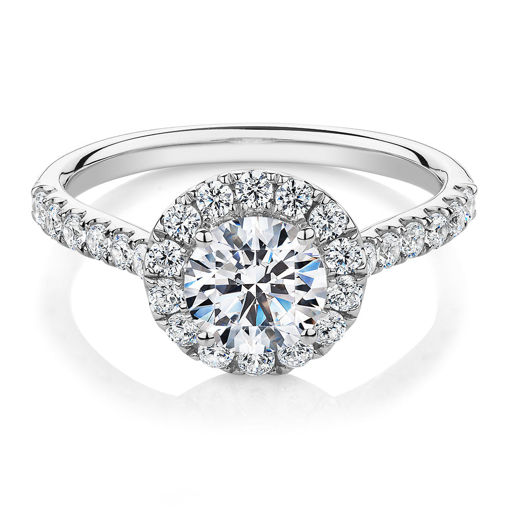 Round Brilliant halo engagement ring with 1.61 carats* of diamond simulants in 14 carat white gold