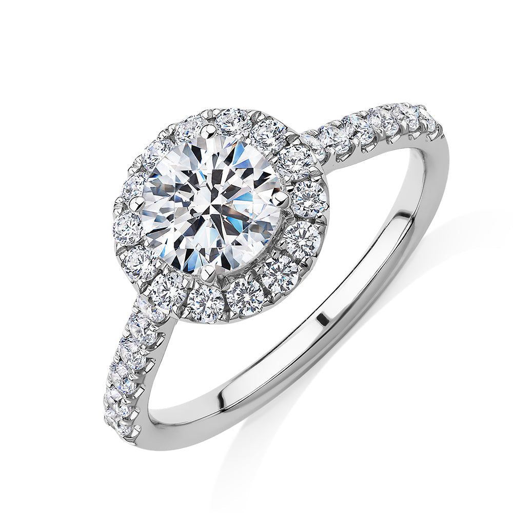 Round Brilliant halo engagement ring with 1.61 carats* of diamond simulants in 14 carat white gold