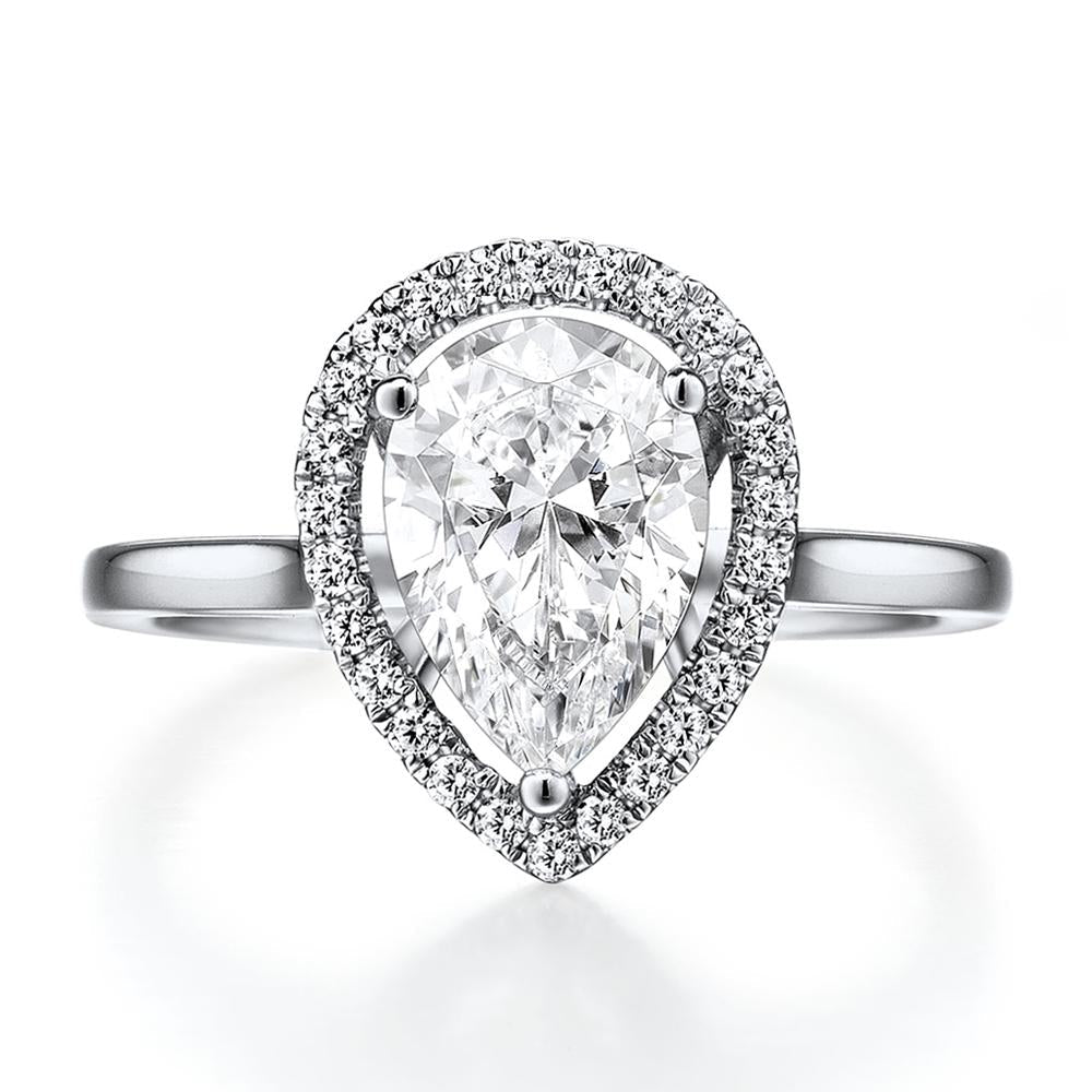 Pear and Round Brilliant halo engagement ring with 1.99 carats* of diamond simulants in 14 carat white gold