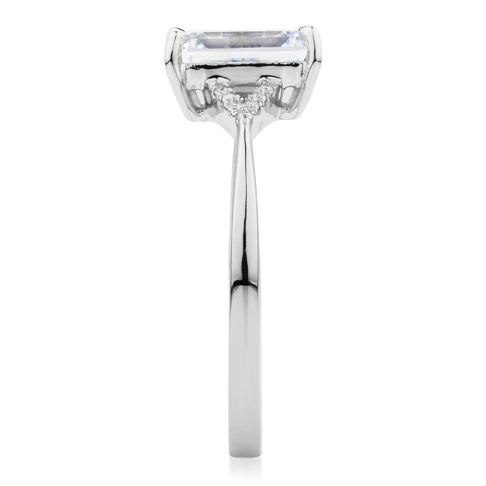 Emerald Cut and Round Brilliant shouldered engagement ring with 1.78 carats* of diamond simulants in 14 carat white gold