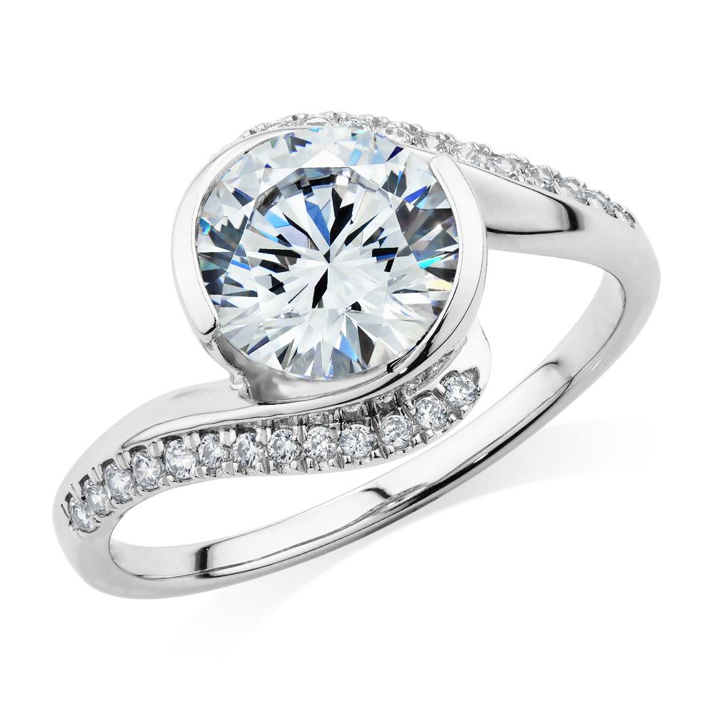 Round Brilliant shouldered engagement ring with 2.19 carats* of diamond simulants in 14 carat white gold