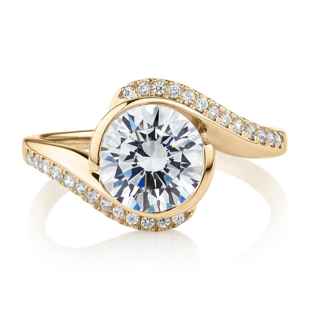 Round Brilliant shouldered engagement ring with 2.19 carats* of diamond simulants in 14 carat yellow gold