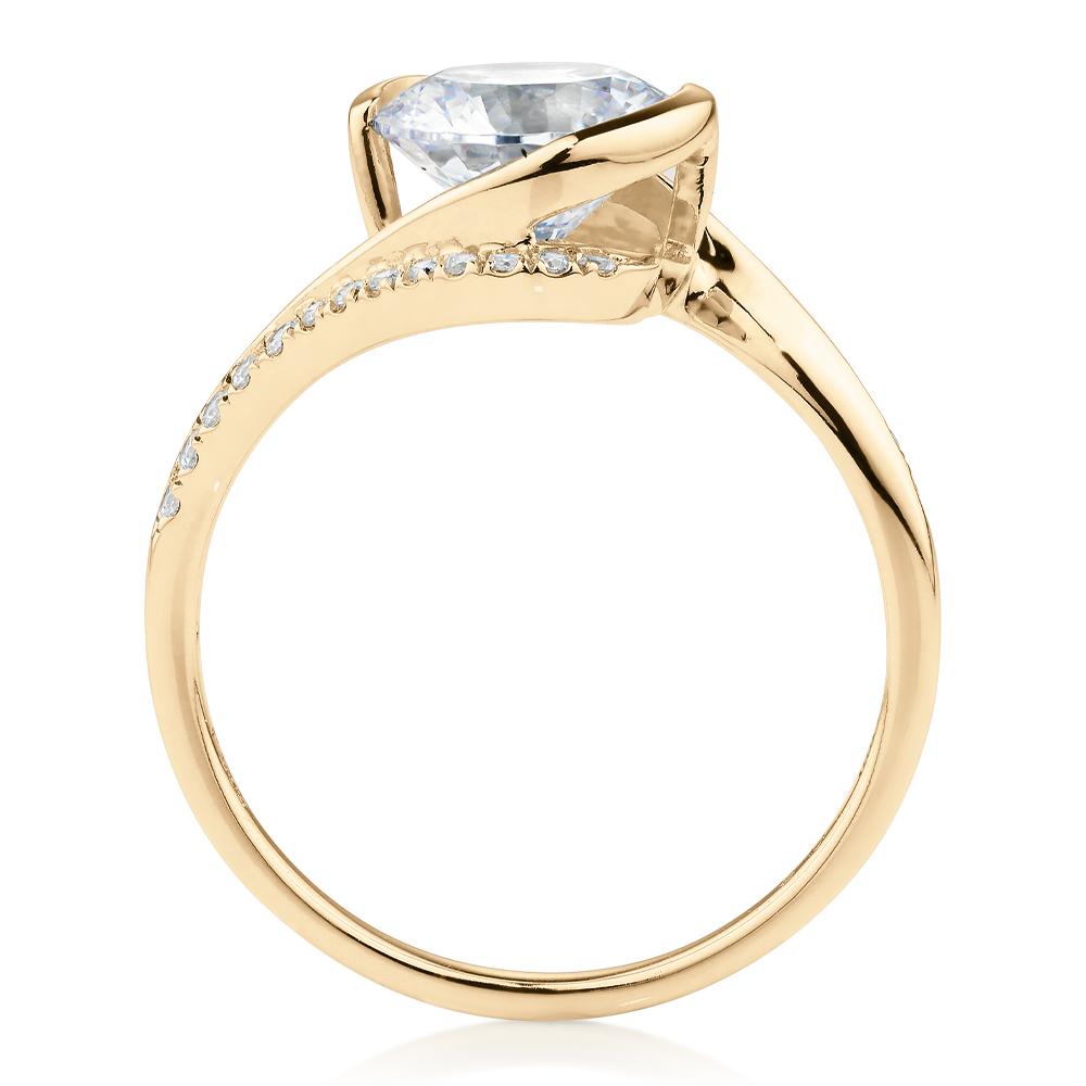 Round Brilliant shouldered engagement ring with 2.19 carats* of diamond simulants in 14 carat yellow gold