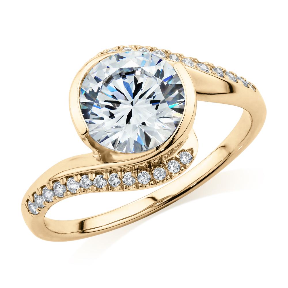 Round Brilliant shouldered engagement ring with 2.19 carats* of diamond simulants in 14 carat yellow gold