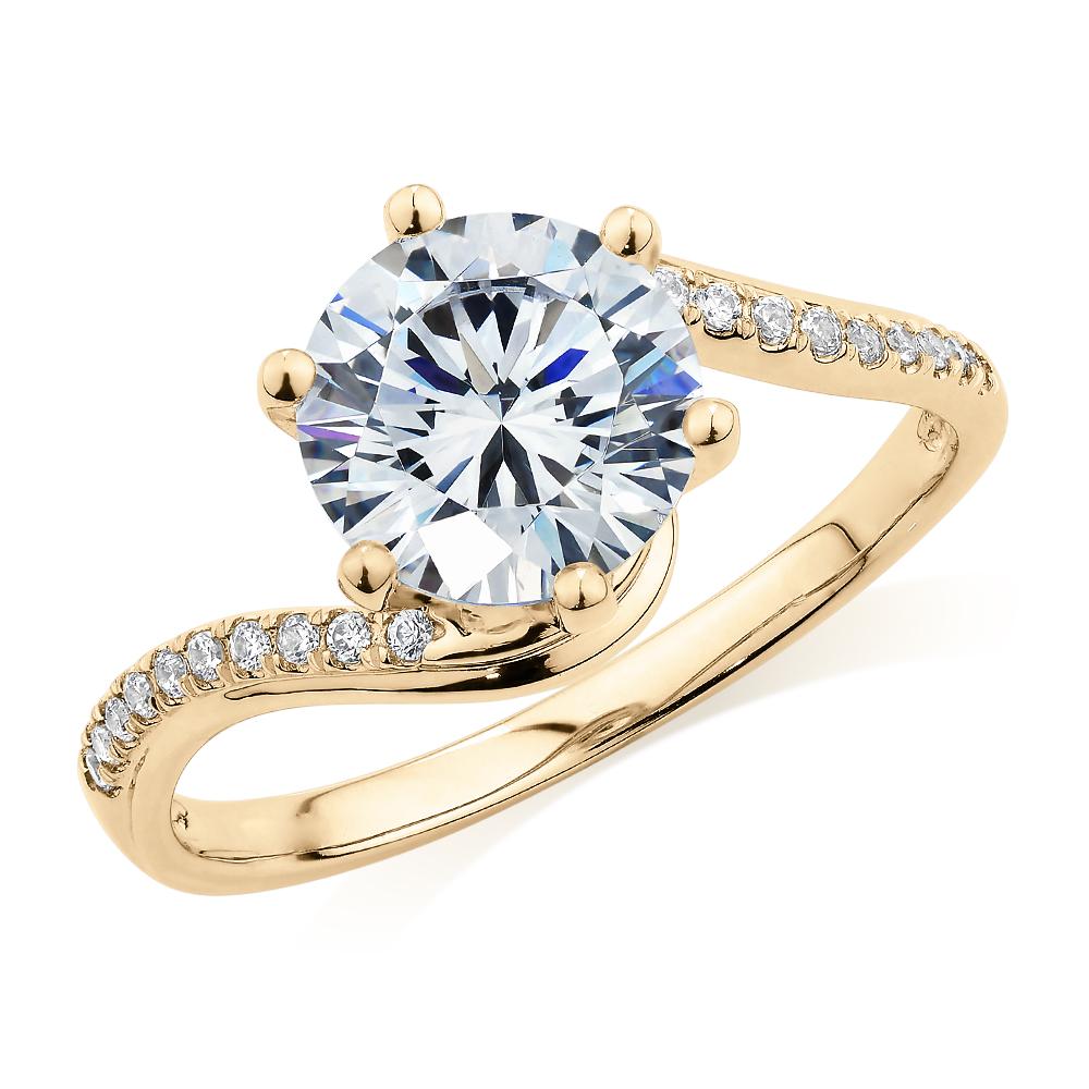 Round Brilliant shouldered engagement ring with 2.14 carats* of diamond simulants in 14 carat yellow gold