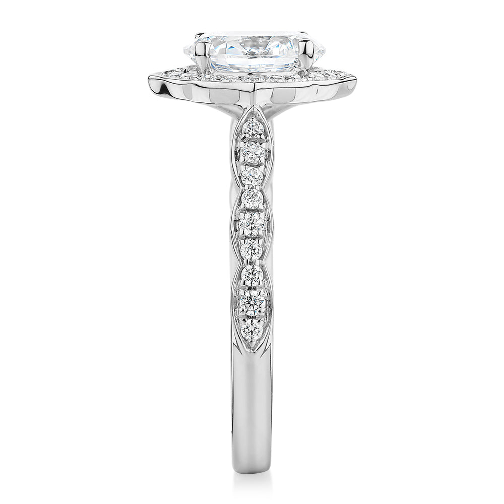 Oval halo engagement ring with 1.55 carats* of diamond simulants in 14 carat white gold